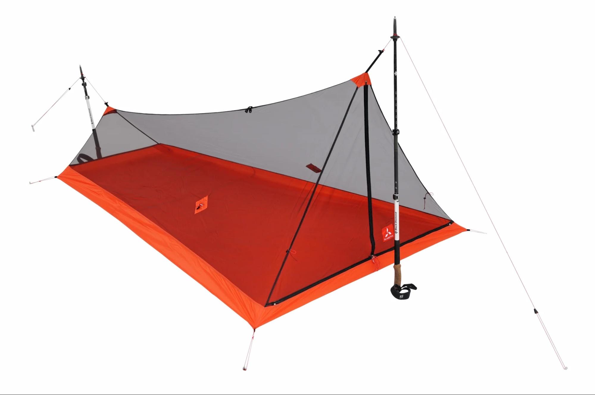 a red and gray tent with poles attached to it